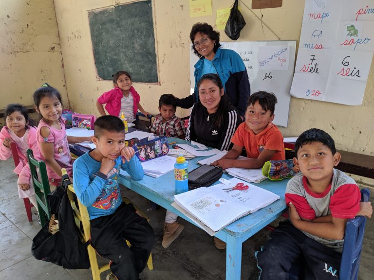 Jesi and Marigil with students.