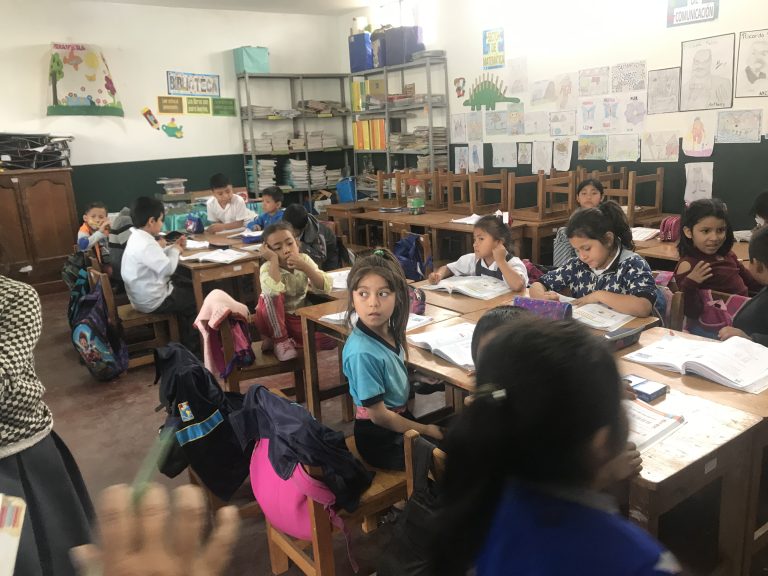 Students at their desks at the 'Indoamerica' elementary school.